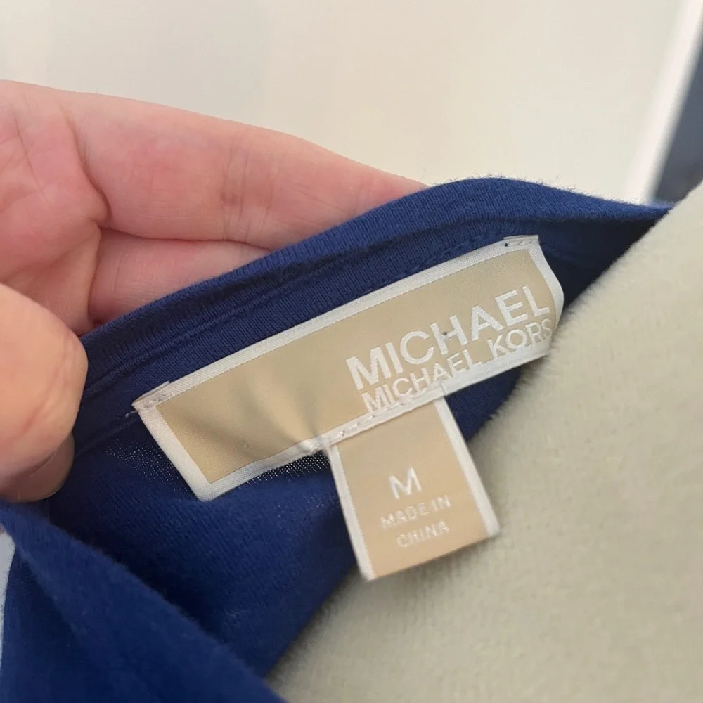 Women’s size medium blue Michael Kors cutout shoulder top